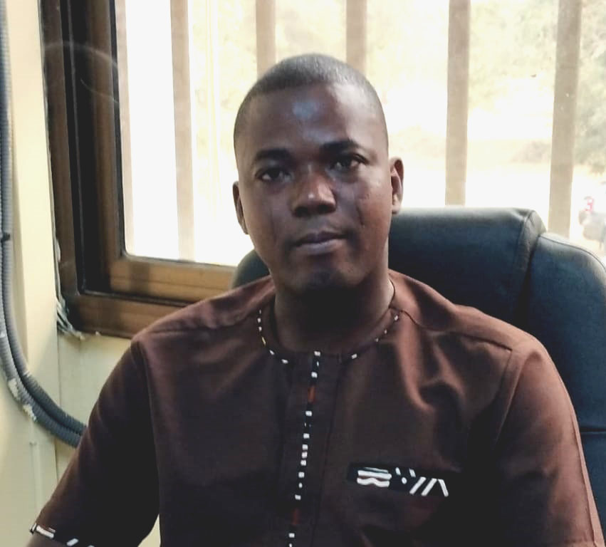 selective focus of man smiling during daytime